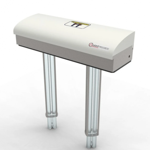 UV-C lamps are equi-spaced and positioned in a grid through which airflow in the duct is forced to move.